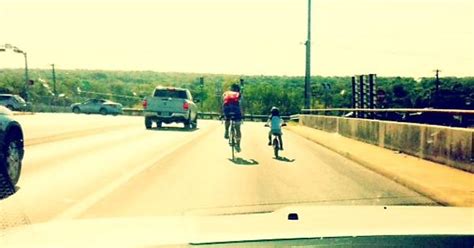 Father Of The Year Taken On A Bridge Going Over A Highway During