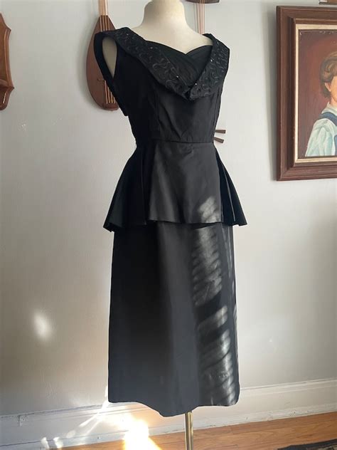 1950s Black Peplum Dress With Rhinestone And Soutache Gem