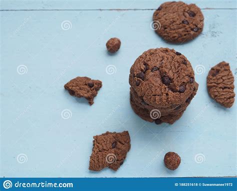 Stack Homemade Double Chocolate Chip Cookies On Blue Wooden Background