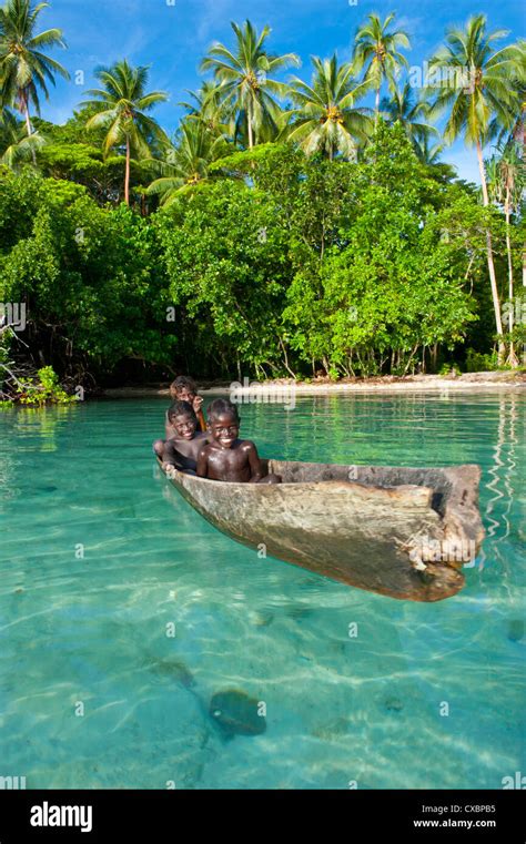 Young Boys Fishing In The Marovo Lagoon Solomon Islands Pacific Stock