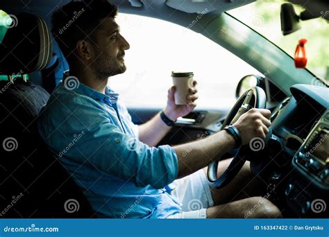 Transportation And Vehicle Concept Young Man Drinking Coffee While