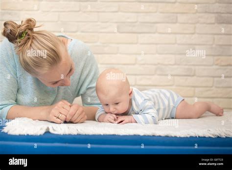 Portrait Of Happy Young Mother And Baby At Home Stock Photo Alamy