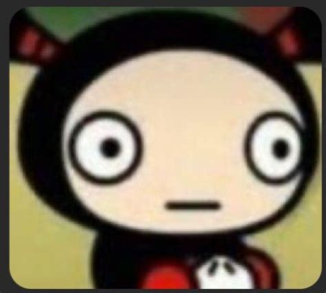 A Cartoon Character With Big Eyes And A Red Bow On Her Head Is Looking