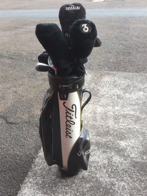 A Set Of Regal Golf Clubs In Titleist Bag