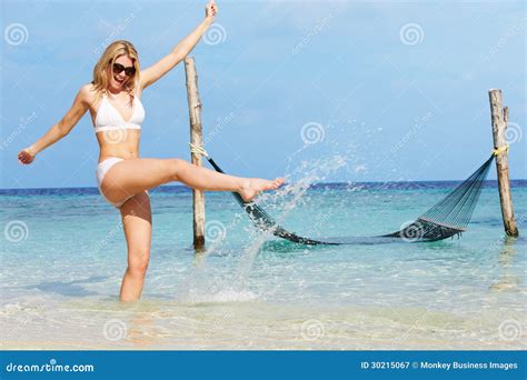 Woman In Bikini Splashing In Beautiful Tropical Sea Stock Image Image