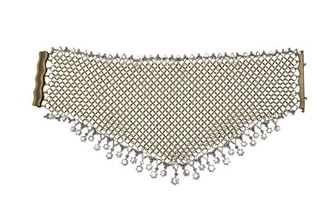 A DIAMOND AND GOLD MESH BRACELET | Christie's