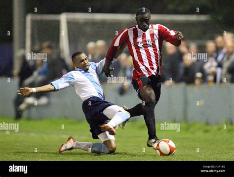 Tambeson Eyong Of Hornchurch Is Challenged By Nicholas Muir Of