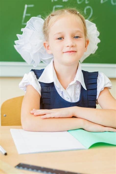Desktop Background Of Student Sitting At Desk For Classwork Stock Image