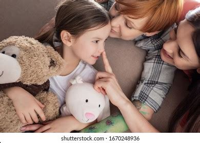 Smiling Same Sex Parents Kissing Touching Stock Photo Shutterstock