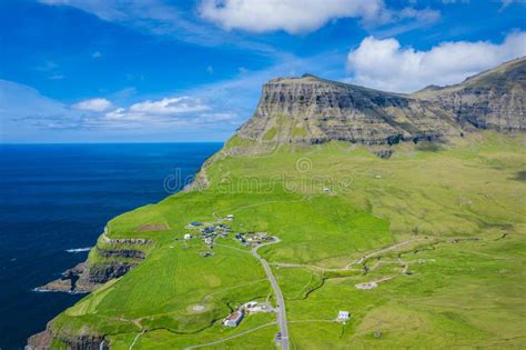 Aerial View Of Mulafossur Waterfall In Gasadalur Village In Faroe