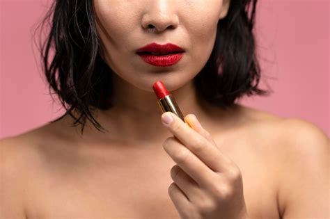 Premium Photo Half Face View Of Brunette Asian Woman With Short Hair And Red Lips