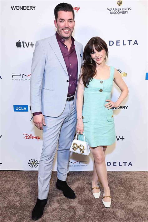 Jonathan Scott and Zooey Deschanel Stroll Along the Seine During Paris