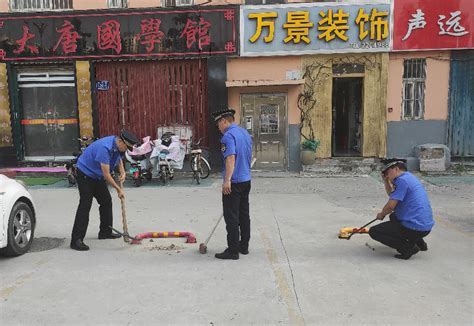 济宁市城市管理局 城管综合执法 执法监察四大队开展私占停车位专项整治（图）