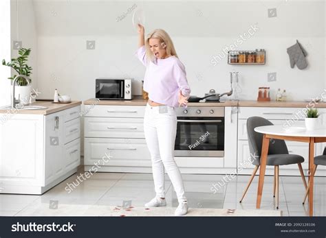 Stressed Young Woman Breaking Dishes Home Stock Photo 2092128106 ...