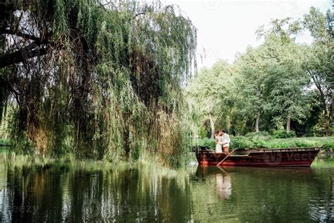 A Boat Trip For A Guy And A Girl Along The Canals And Bays Of The River