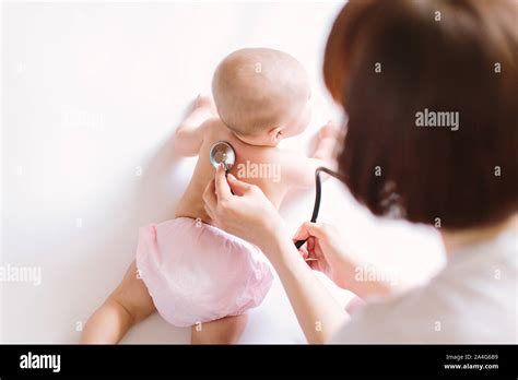 Doctor Listening To Babys Chest Hi Res Stock Photography And Images Alamy