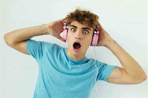 Handsome Young Man In Blue T Shirts Pink Headphones Fashion Isolated