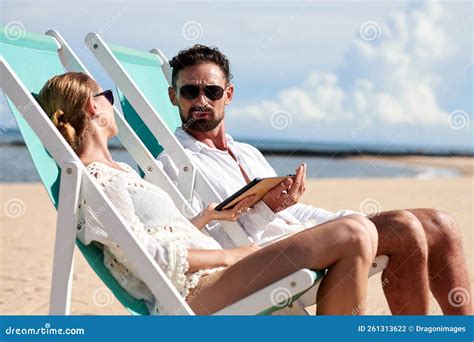 Couple Sunbathing On Beach Stock Photo Image Of Journey