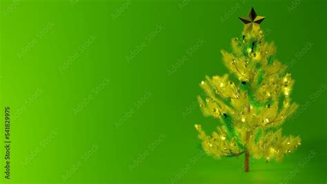 Illuminated yellow Christmas tree with a green screen background with ...