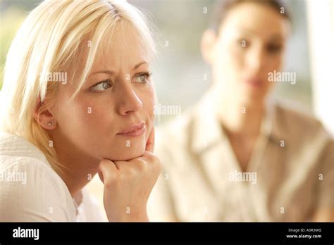 Two Women In Discussion Stock Photo Alamy