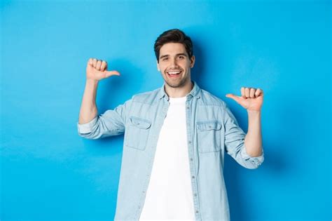 Free Photo Portrait Of Confident Man Pointing At Himself Being A