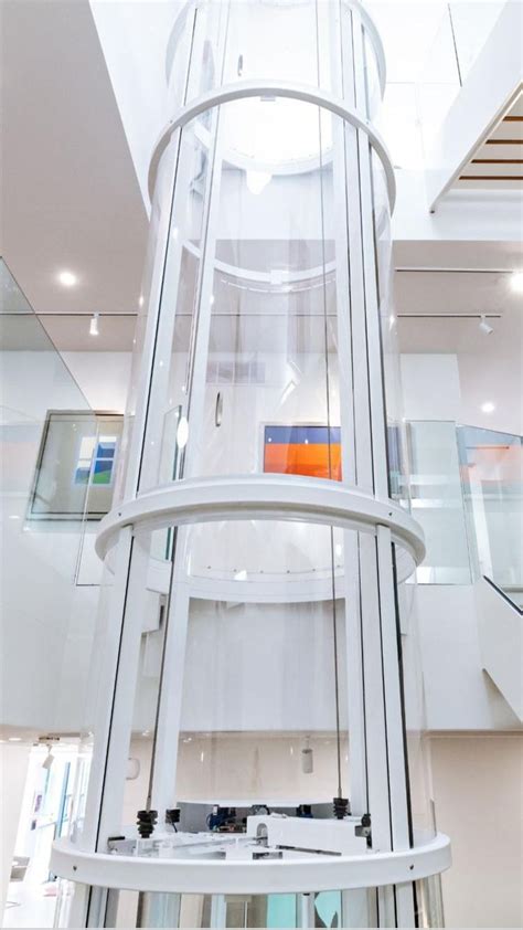 Art Gallery Design With Savaria Vuelift Panoramic Glass Home Elevator