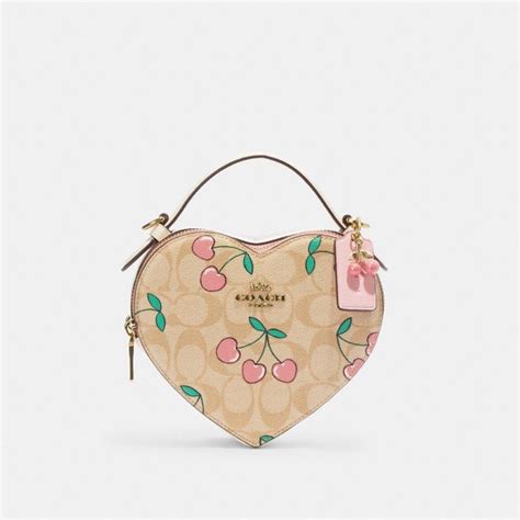 Sac bandoulière Heart en toile exclusive avec imprimé caur cerise