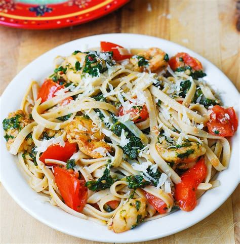 Shrimp Tomato And Spinach Pasta In Garlic Butter Sauce