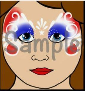 The Face Of A Woman With Blue Red And White Make Up On Her Eyes