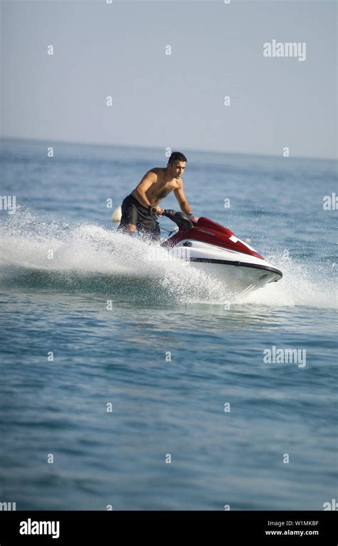 Man Riding Jetski Sports Man On Jetski Stock Photo Alamy