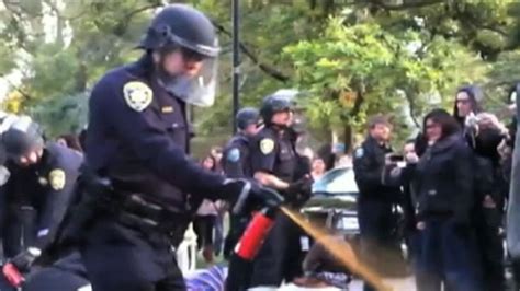 Occupy Uc Davis Pepper Spraying Cops Suspended Abc News