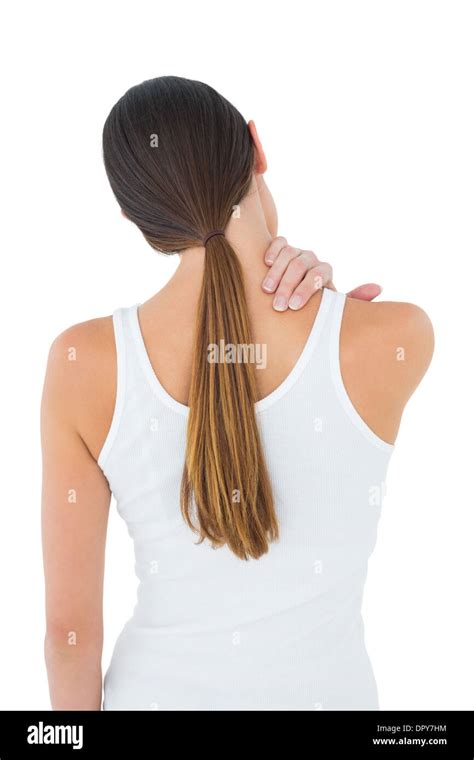 Rear View Of A Casual Woman Suffering From Neck Ache Stock Photo Alamy