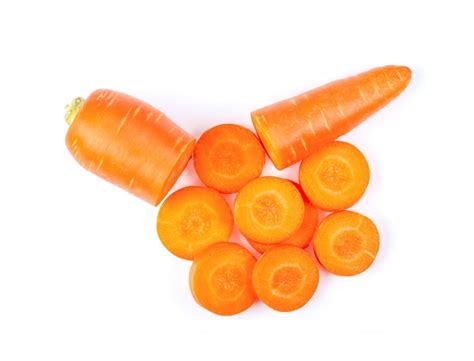 Slice carrot isolated on white | Premium Photo