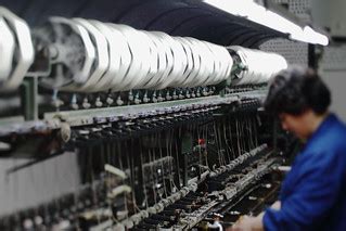 Silk Rug factory | pulling silk off silk balls onto spools | Kevin ...