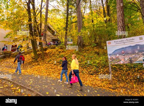 Brasov, ROMANIA - October 21 2018: People walking up to the Tampa cable ...