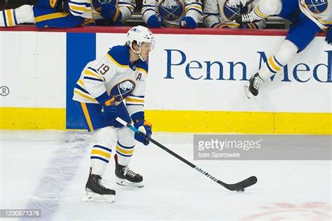 Buffalo Sabres Defenseman Jake Mccabe Skates With The Puck During The