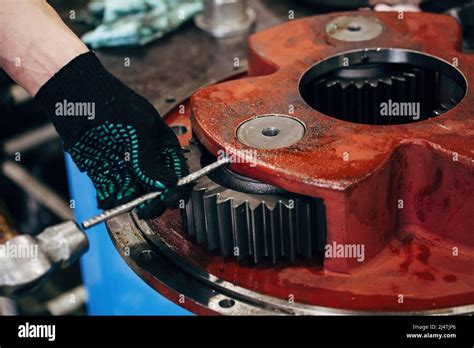 Worker Assembling The Planetary Gear Stock Photo Alamy