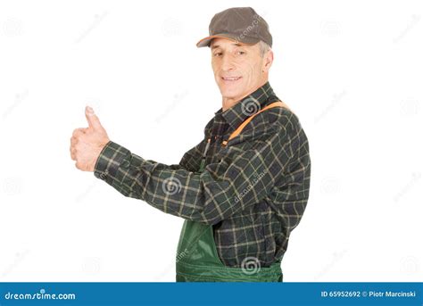 Mature Gardener In Uniform With Thumbs Up Stock Photo Image Of Pose