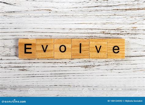 Evolve Word Made With Wooden Blocks Concept Stock Photo Image Of