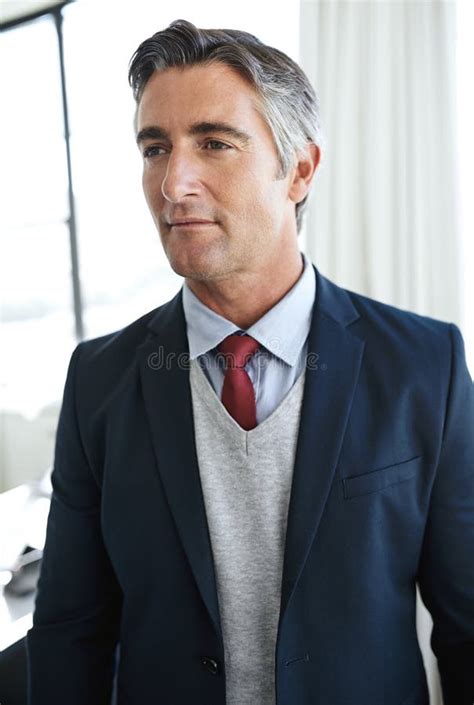 Hes Driven To Succeed A Mature Businessman Looking Thoughtful In The