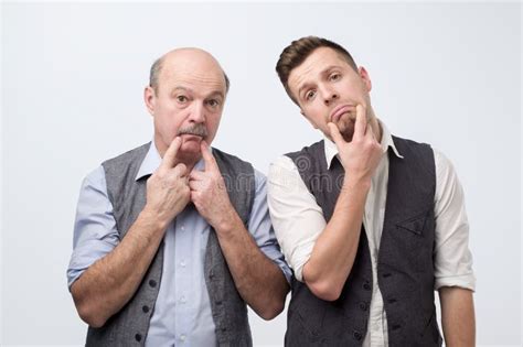 Two Mature Men Father And Son Being Sad Negative Facial Emotion Stock Image Image Of Empathy