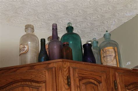 antique bottles add such color and light to any room,,,, | Antique ...