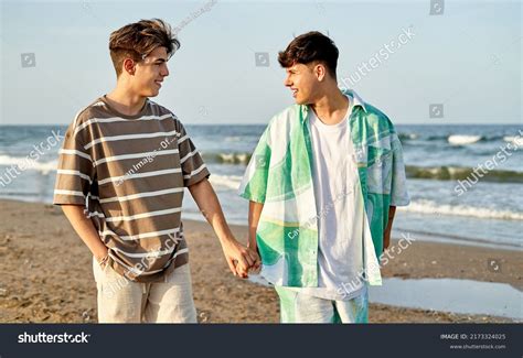 Happy Gay Couple Walking Along Beach Stock Photo 2173324025 Shutterstock