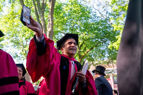 Rakesh Khurana Holds Up Photo News The Harvard Crimson