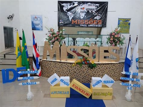 The Letters Are Made Out Of Cardboard And Placed In Front Of Flags