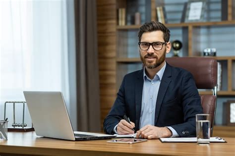 Premium Photo Portrait Of Successful Smiling Man In Office Mature