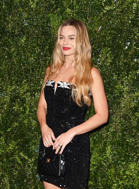 Margot Robbie At Charles Finch Chanel Pre Bafta Party In England