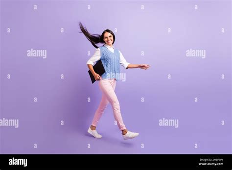 Full Length Body Size View Of Attractive Brunette Cheerful Girl Hr Walking Carrying Clipboard