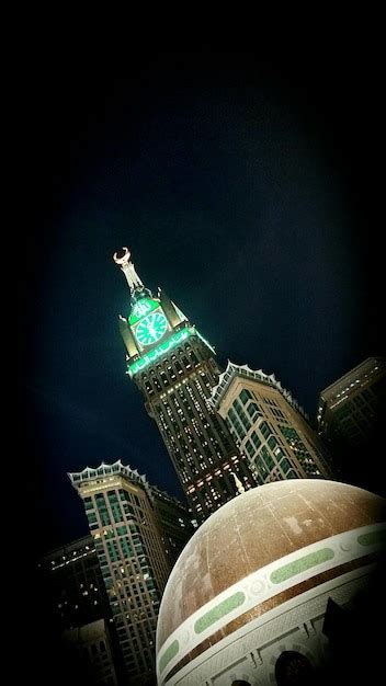 Premium Photo | Low angle view of abraj al-bait towers at night