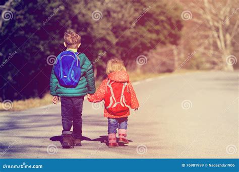 Kids Walking On The Pedestrian Crossing Royalty Free Stock Image